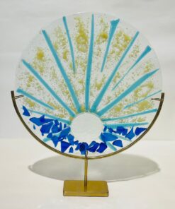 Blue rising sun on glass fusion stand